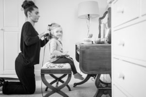 Cute little flowergirl having her hair done ready for the Wedding Day