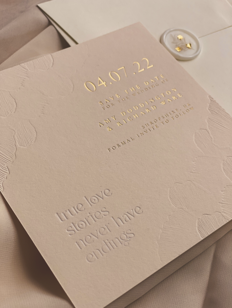 Save the Date from a TLPS Wedding Invitation Suite with gold foiling and emboss
